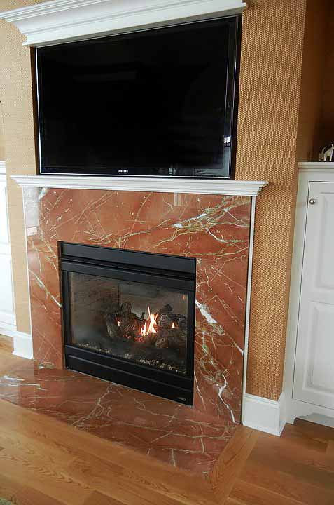 Fireplace surround by Pistritto Marble — linear fireplace with red-veined stone surround