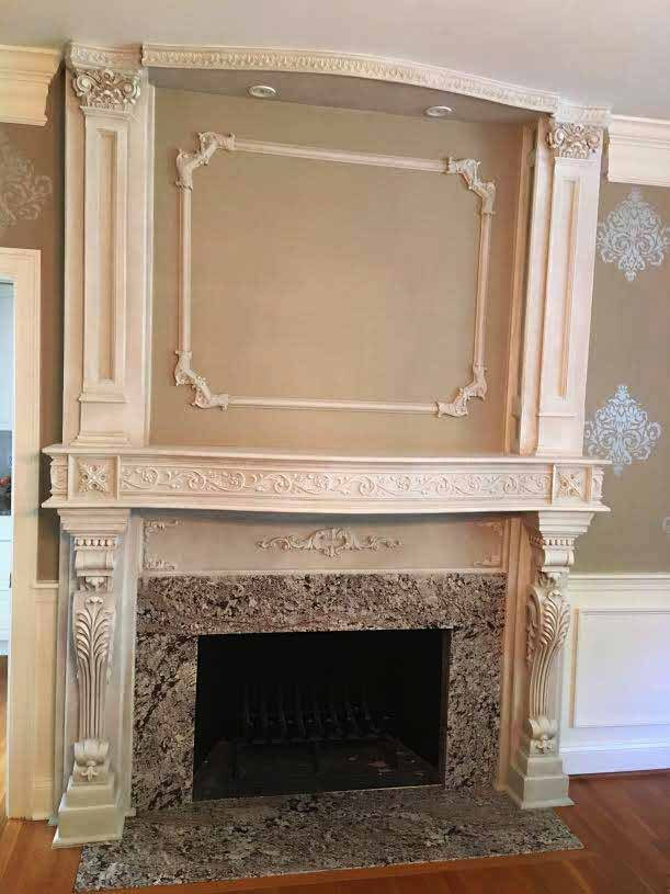 Fireplace surround by Pistritto Marble — traditional carved surround detail