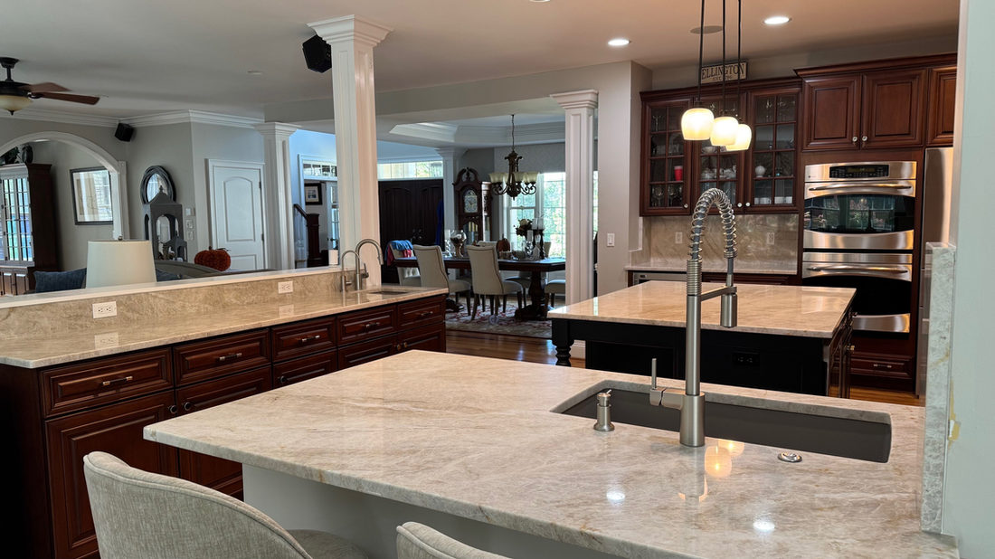 Kitchen countertop project by Pistritto Marble — large island with seating and undermount sink