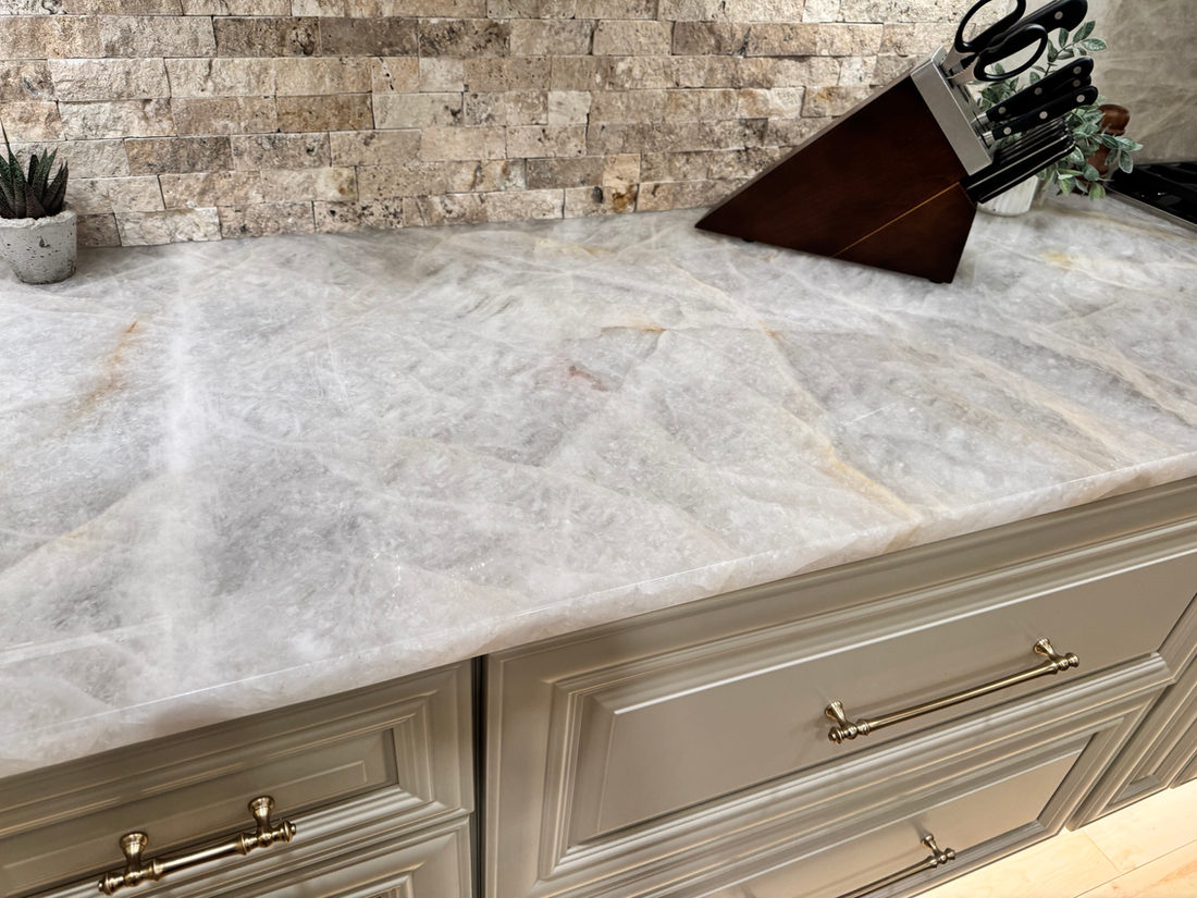 Kitchen countertop project by Pistritto Marble — quartzite counter with stacked-stone backsplash