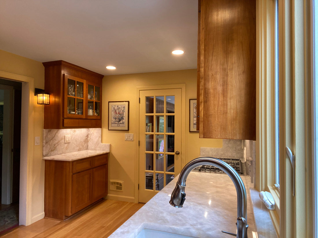 Kitchen countertop project by Pistritto Marble — wet bar counter in warm wood kitchen
