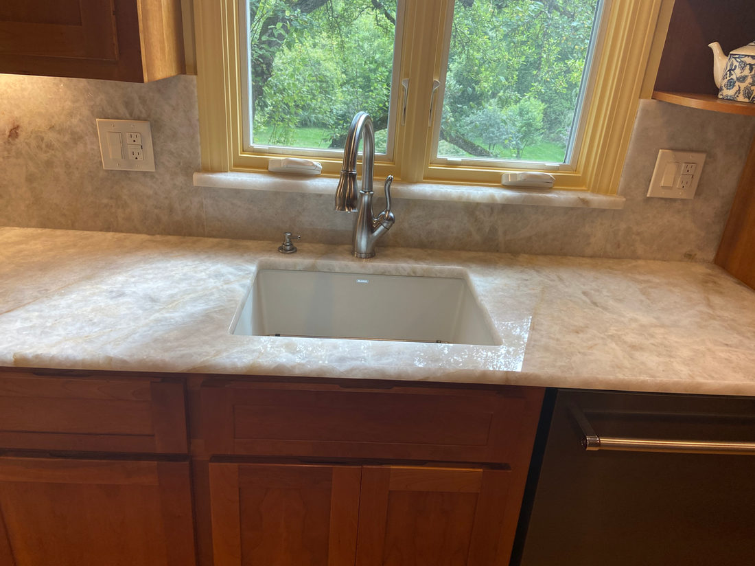 Kitchen countertop project by Pistritto Marble — window-run counter with undermount sink