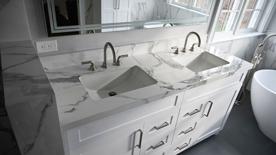 Bath project by Pistritto Marble — double vanity with veined stone top
