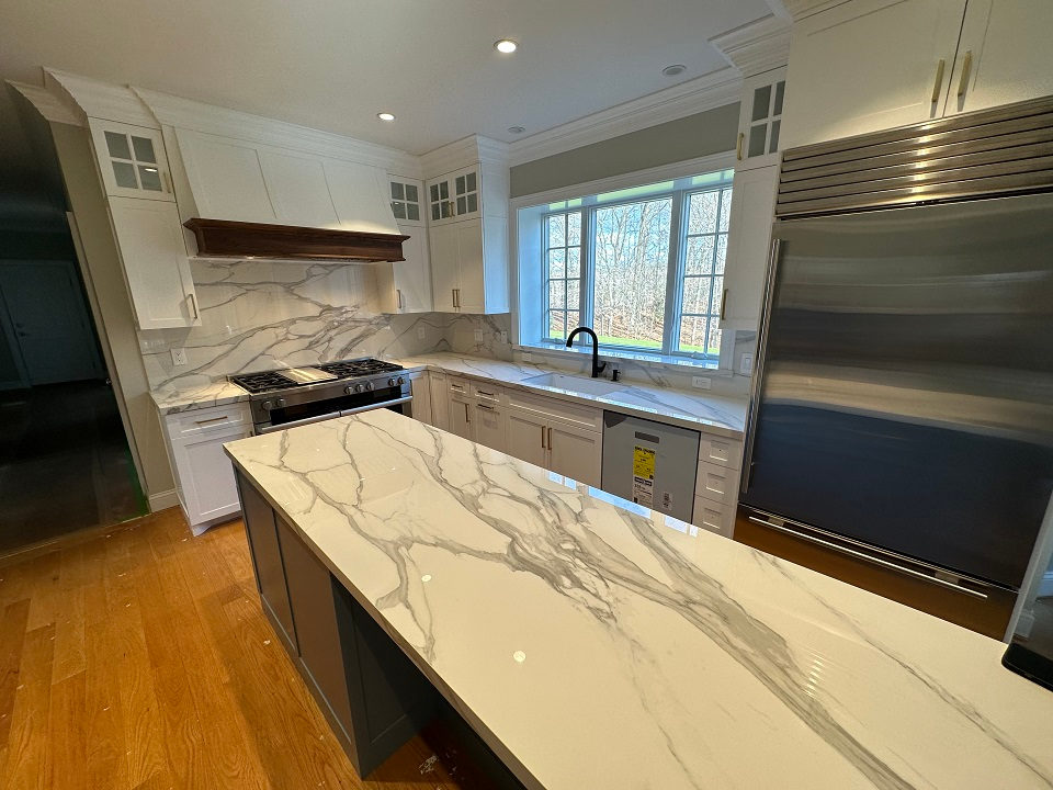 Calacatta-look porcelain island installed by Pistritto Marble in Connecticut