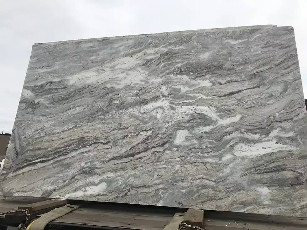 Leathered quartzite slab on the rack at the Pistritto Marble store